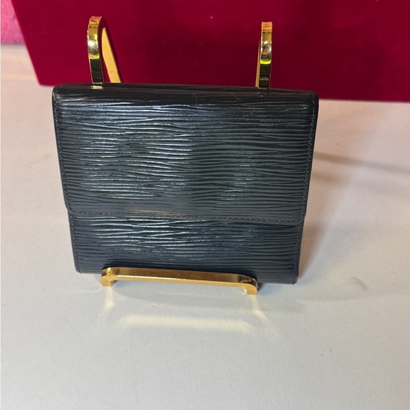 Louis Vuitton Handbags - Louis Vuitton Epi Bifold wallet compact 4x4 black and purple